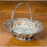 A silver oval bon bon basket with pierced decoration, part hallmark, probably William Plummer,