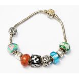 A Pandora style bracelet,