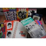 Collection of Beatles magazines and tour programmes.