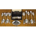 A cased set of silver teaspoons, Sheffield 1948/49, ten silver table and dessert spoons,