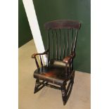 A 19th Century Windsor type rocking chair, possibly American,