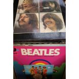 A large collection of Beatles Records ( 2 boxes ) Including the Let it be red apple lp housed in