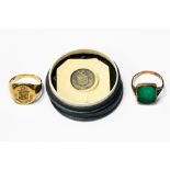 An 18ct yellow gold seal ring bearing a coat of arms for the "Tweedie" family, size N,