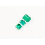 Three loose emeralds all emerald cuts ranging in size from 8x6mm, 5x5mm,