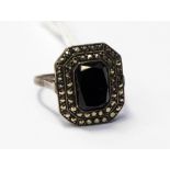 An Art Deco onyx and marcasite ring