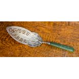 A George III silver and stained ivory fish slice, the blade bright cut and pierced,