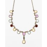 A silver necklace, set with facetted semi precious stones,