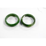 Two spinach and jade bangles,