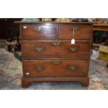 A George III two above two small chest of drawers on bracket feet, brass swing handles,