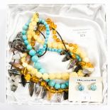 A collection of semi precious bead jewellery, comprising an amber necklace,