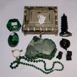 A collectors lot of malachite, to include a beaded necklace, an egg on stand,