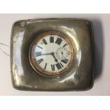 A travelling clock with silver outer case, Chester assayed, markers mark A.B.