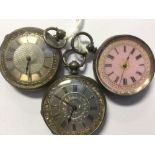 A group of three ladies silver pocket watches comprising one with a pink enamel dial and gilt