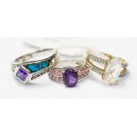 A silver ring set with an amethyst, triple opal and white topaz, size S,