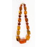 An amber necklace graduating beads (note some clarified treaded beads)
