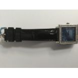 An Aqua Marin wristwatch with a square blue mother of pearl dial, approx diameter 27mm,