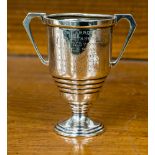 A small silver two handled trophy Sheffield 1947/8 Walker & Hall,