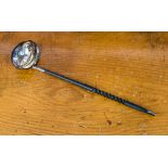 An Elizabeth II silver punch ladle, turned ebony handle, Sheffield 1977,