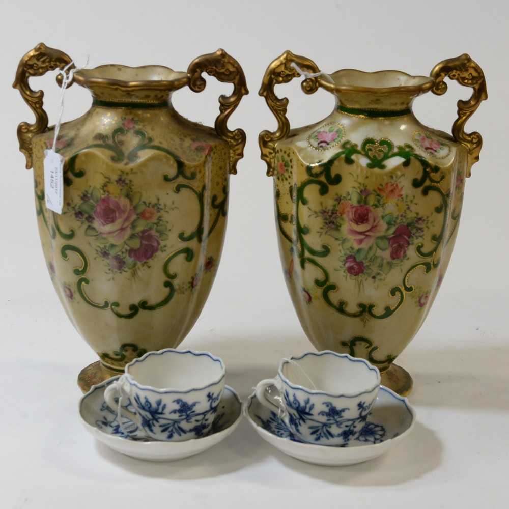 A pair of Meissen onion pattern cups & saucers. with a pair of Noritake vases.