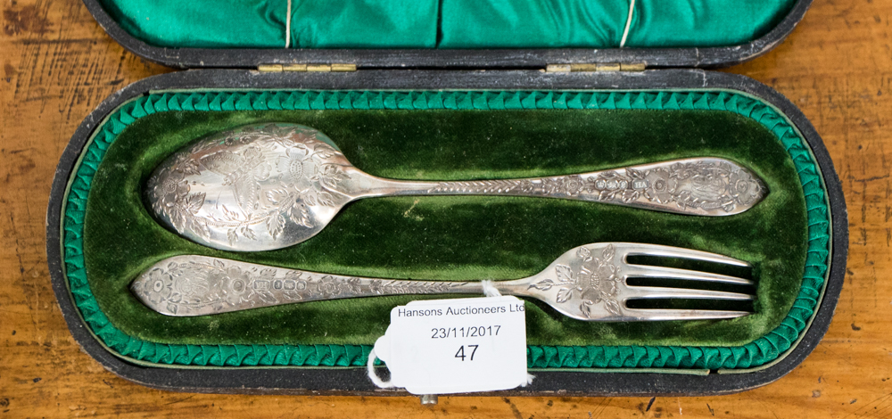 A cased silver spoon and fork Christening set, Sheffield 1897 Atkin Brothers,