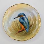 A hand painted plate, depicting a Kingfisher, signed H Creed,