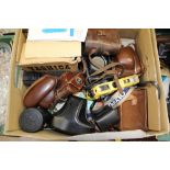 A pair of Edwardian (1920) leather cased binoculars,