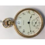 A gold plated Waltham pocket watch,