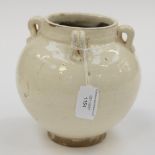 A glazed white terracotta bulbous vase,
