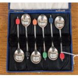 A cased set of six bean coffee spoons,