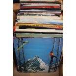 Collection of 7" records, rock and pop, including The Beatles, David Bowie, The Cult, Moody Blues,