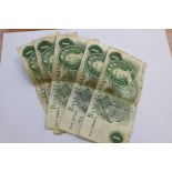 A collection of five 1 Pound banknotes,