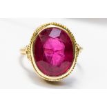 A yellow metal, pink tourmaline ring,