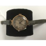 A circa 1920s lady's nine carat gold Vesta wristwatch,