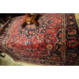 A Persian carpet red and blue field,