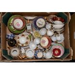 One box containing miniature tea cups,