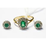 An emerald and diamond cluster ring,