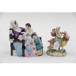 An early nineteenth Century Staffordshire figure of 'The Welsh Tailor's Wife',