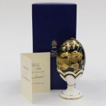 Royal Crown Derby black and gold egg and stand,