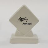 A Lorna Bailey Artware advertising plaque, diamond form, plain white,