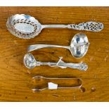 An Edwardian bright-cut engraved and pierced large sifting spoon,