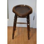 A elm seated country stool