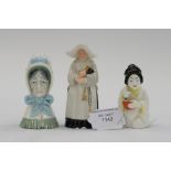A Royal Worcester porcelain candle snuffer of a nun,