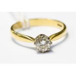 A solitaire diamond ring, claw set brilliant cut, approx 0.