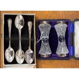 A boxed pair of cut glass with silver end collars - knife rests, Birmingham 1905,