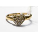 A 9ct gold and diamond heart shaped ring, finger size S,