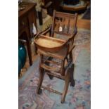 An early 20th Century child's commode chair