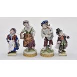 Four continental figures, marked to base,