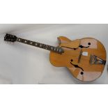 An acoustic Nardan guitar made in Japan and marketed to American GI's serving in the Korean War in