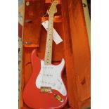 A Fender Stretocaster guitar "New Old Stock". Red & White. Made to old spec. Invoice in box.