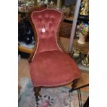 A pair of Victorian walnut and upholstered salon chairs,